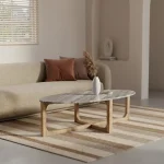Oval brown coffee table with marble top